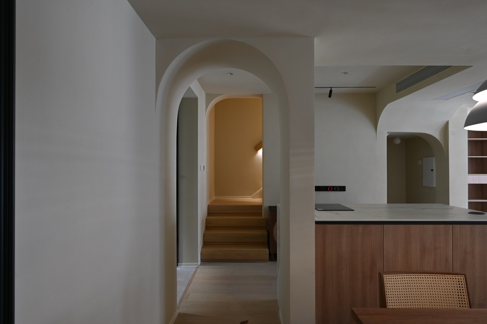 Duplex villa arched stairway